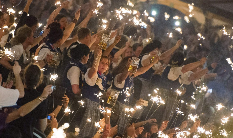 Oktoberfest waitresses celebrate the end of the world's biggest beer festival in Munich