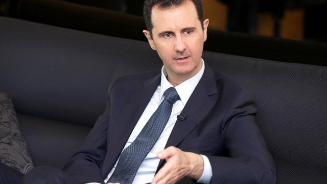 Handout photo of Syria's President Bashar al-Assad speaking during an interview with German magazine Der Spiegel in Damascus