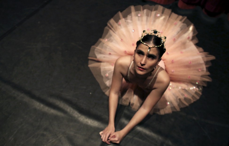 Blind student Marina Gimaraes of the Association of Ballet and Arts for the Blind, warms up backstage before performing 'Corsario' e 'Paquitas' in Sao Paulo