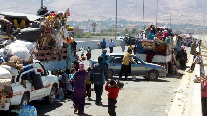 Syrian refugees flee conflict in Lebanon
