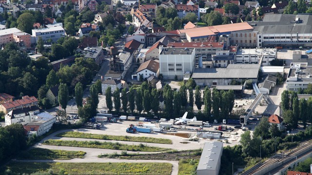 Stadtplanung: Eine Luftaufnahme des ehemaligen Werksgeländes der MD-Papierfabrik, das mit seiner Größe von zentraler Bedeutung für die Stadtentwicklung ist.