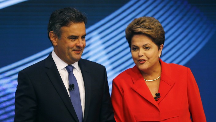 Presidential candidates Neves of Brazilian Social Democratic Party and Rousseff of Workers Party arrive at a television debate in Rio de Janeiro