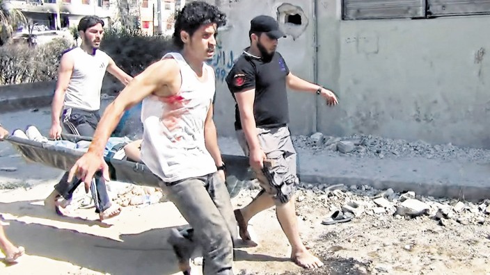 Dokumentarfilm "Return to Homs": Der Filmemacher Talal Derki hat selbst in Homs gedreht, verwendet aber auch Bildmaterial der Rebellen: Szene aus "Return to Homs".