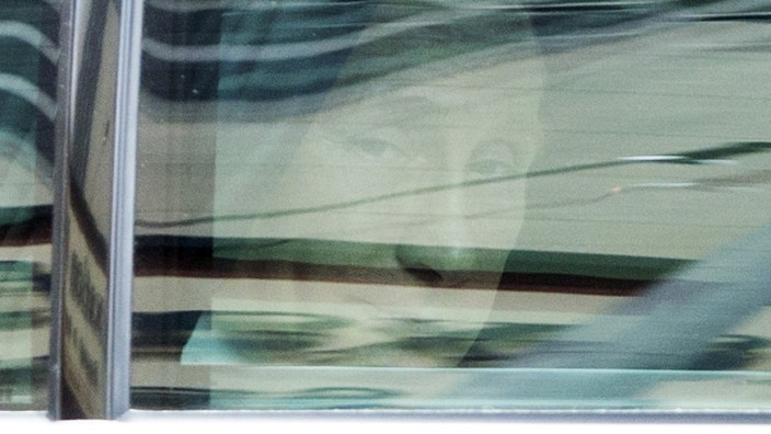 File photo of Russian President Putin looking out from his limousine en route to Brisbane Airport as he leaves the G20 leaders summit early