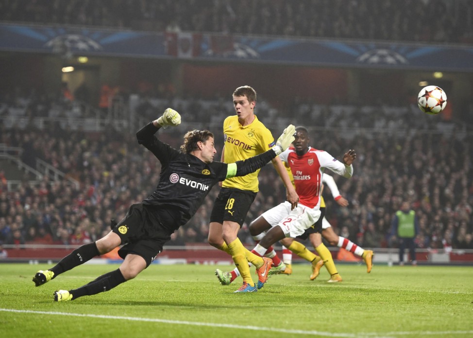 Borussia Dortmund's goalkeeper Weidenfeller makes save in Champions League match against Arsenal in London