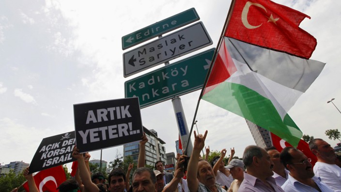 Demonstrators chant nationalist slogans during a protest against Israel near the Israeli Consulate in Istanbul