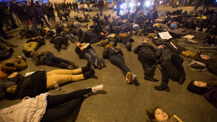 141205 CHICAGO Dec 5 2014 Protesters lie on a street of Chicago the United States on nig