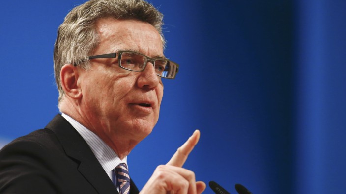 German Interior Minister de Maiziere addresses the CDU party convention in Cologne