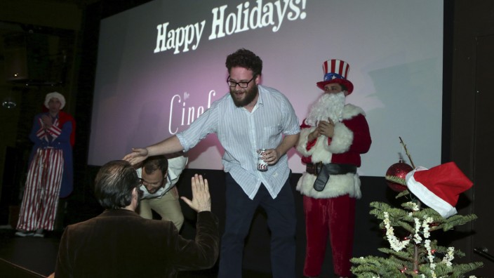 Goldberg and Rogen greet attendees at a midnight screening of 'The Interview' at the  Silent Movie Theatre in Los Angeles, California