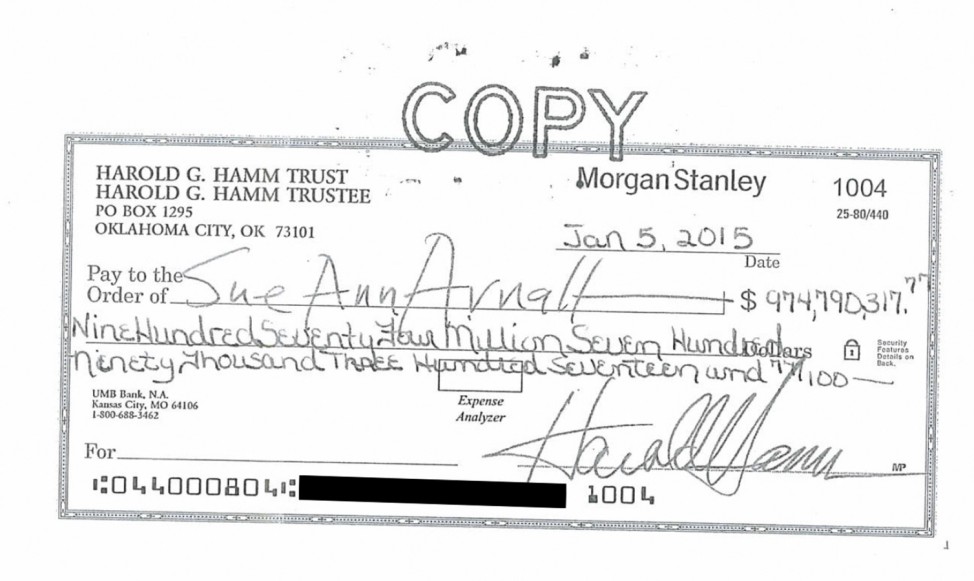 A divorce settlement check from Harold Hamm chief executive of oil driller Continental Resources to ex-wife Sue Ann Arnall in the amount of $974.8 million is seen in this handout image