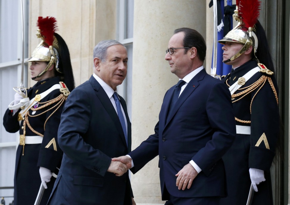 French President Francois Hollande welcomes Israel's Prime Minister Benjamin Netanyahu at the Elysee Palace before attending a solidarity march in the streets of Paris
