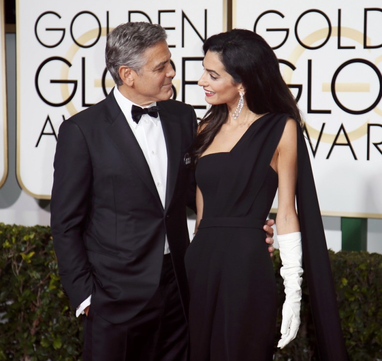 George and Amal Clooney arrive at the 72nd Golden Globe Awards in Beverly Hills