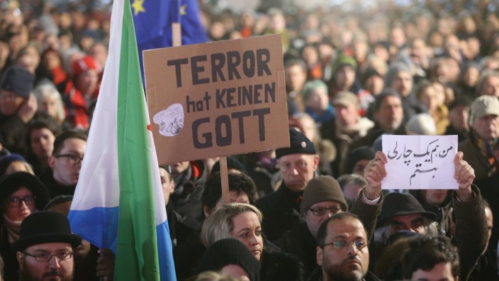 Muslims Hold Berlin Vigil Following Paris Attacks