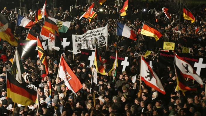File photo shows supporters of anti-immigration movement Patriotic Europeans Against the Islamisation of the West (PEGIDA) during a demonstration in Dresden