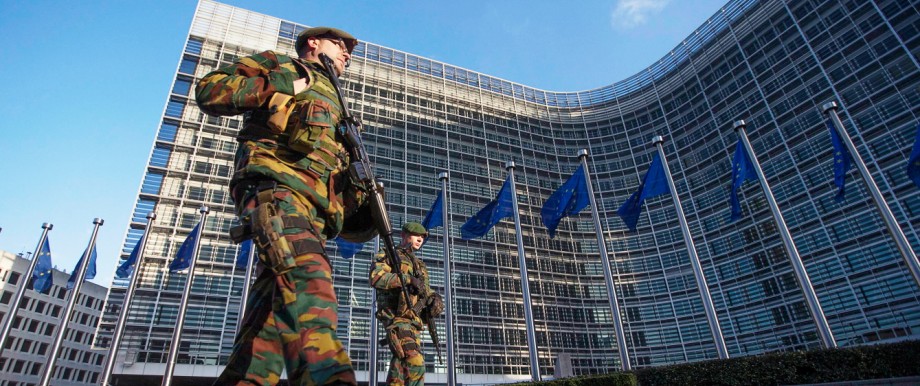 Belgian soldiers patrol outside the European Commission headquarters in central Brussels