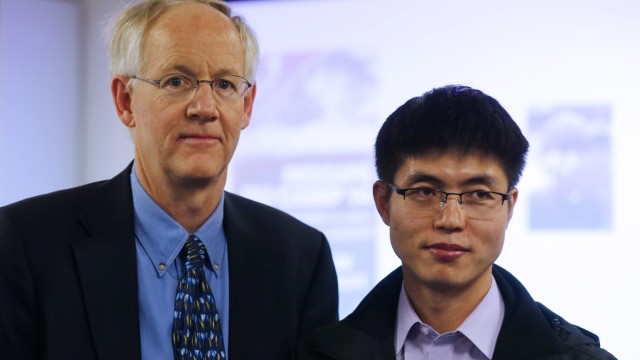 File photo of Blaine Harden, former Washington Post journalist, and Shin Dong-hyuk posing before a news conference to present their book 'Escape from Camp 14' in Paris