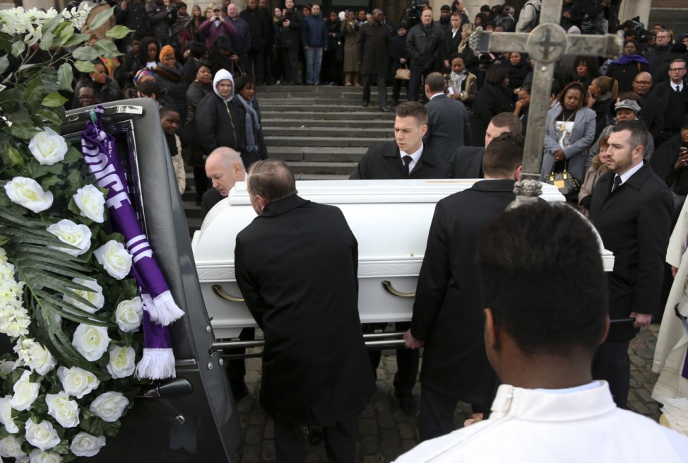 Pallbearers carry the coffin of VfL Wolfsburg midfielder and Belgium Under-21 international Malanda, after a funeral service at the Koekelberg Basilica in Brussels