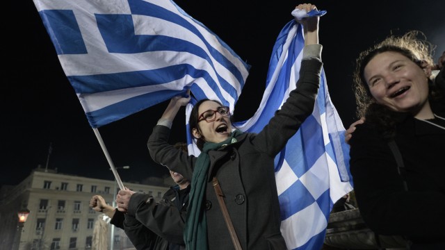 Wahlsieg von Syriza: Syriza-Anhänger feiern in Athen den Wahlsieg des Links-Bündnisses.
