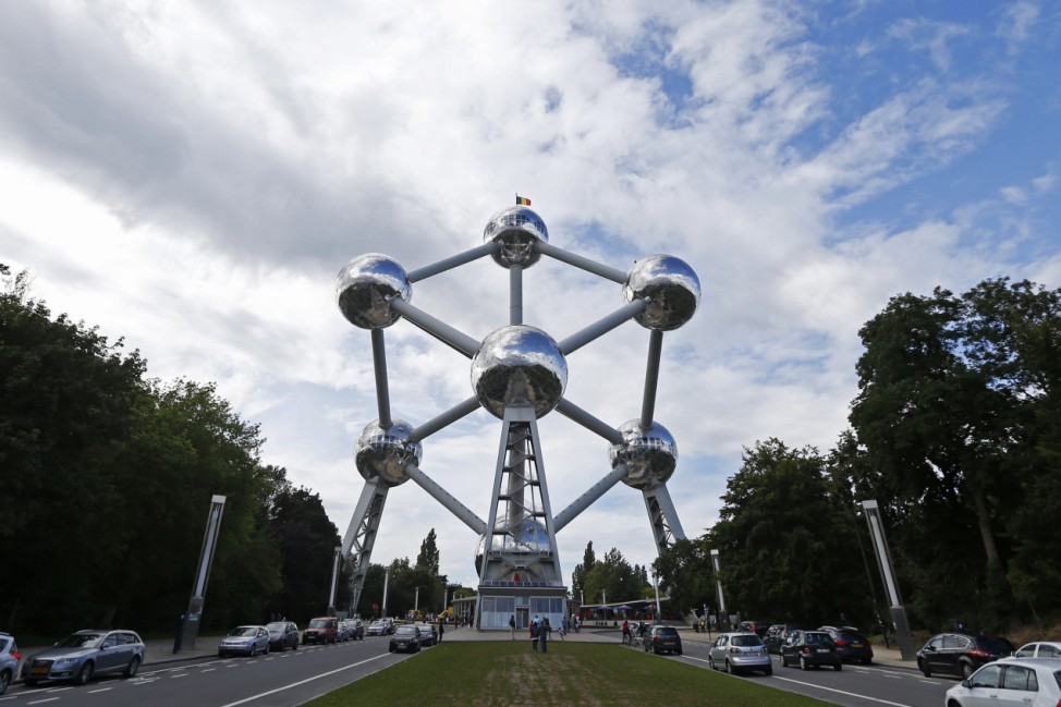 A general view of the Atomium monument is seen as a tightrope walker performs between two spheres in Brussels