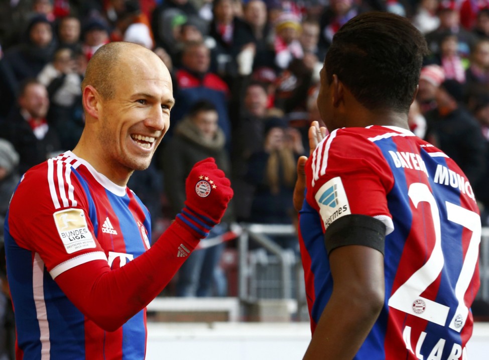 Bayern Munich's Robben celebrates his goal with Alaba during their German Bundesliga first division soccer match in Stuttgart