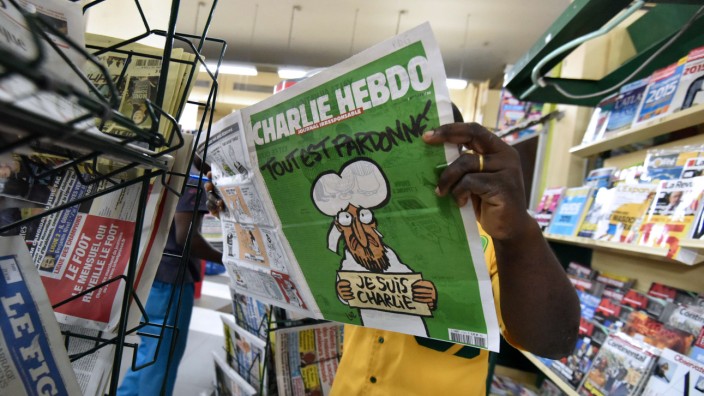 Angriffe auf Medien: Die erste Ausgabe von Charlie Hebdo nach dem Angriff auf die Redaktion.
