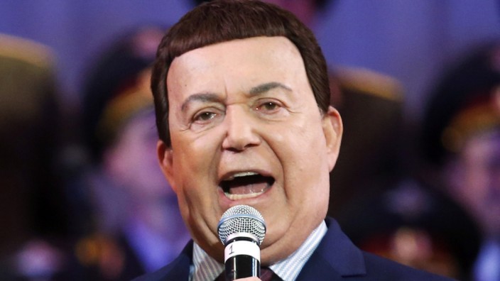 File photo of Iosif Kobzon, a Russian singer and a deputy of the State Duma, singing during a concert, in Donetsk