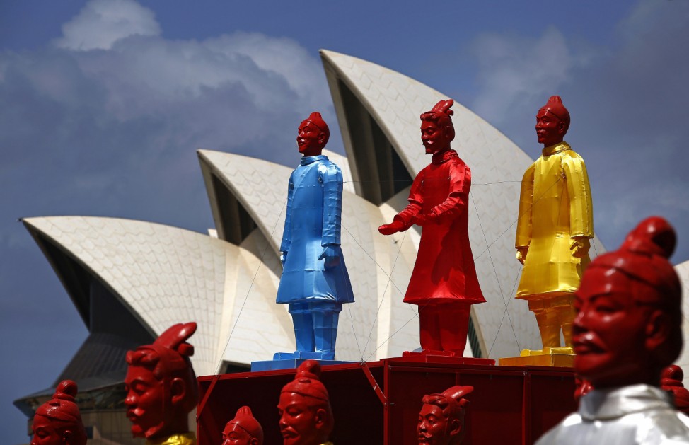 An art installation called the 'Lanterns of the Terracotta Warriors' stands in front of the Sydney Opera House
