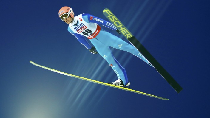 Freund of Germany soars through the air during his first jump of the men's normal hill individual HS100 ski jumping event at the Nordic World Ski Championships in Falun