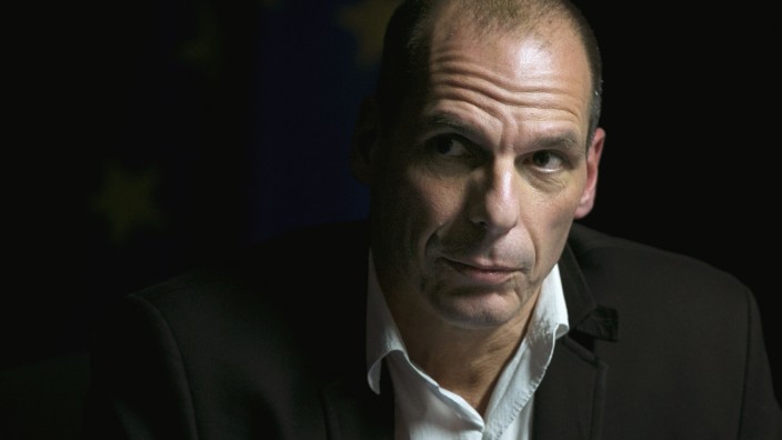 Varoufakis arrives at a news conference after an extraordinary euro zone Finance Ministers meeting in Brussels