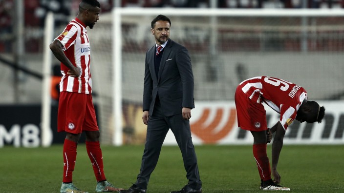 Olympiakos' head coach Vitor Pereira reacts after his team's defeat against Dnipro in their Europa League round of 32 second leg soccer match at Karaiskaki stadium in Piraeus