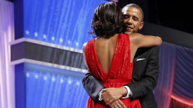 President Barack Obama and first lady Michelle Obama dance as Jennifer Hudson performs at the Commander in Chief's Ball in Washington