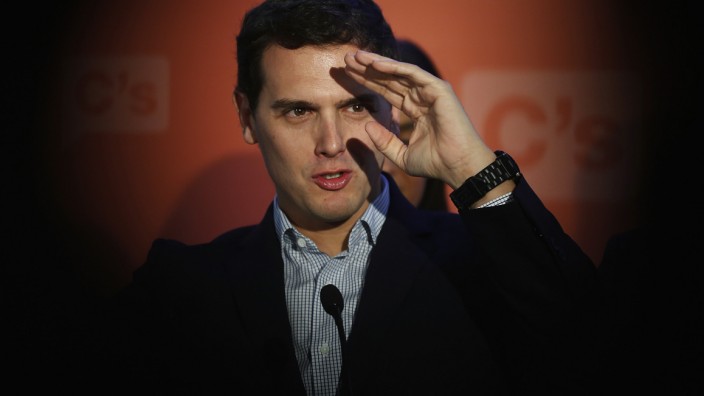 Rivera gestures as he takes questions during a news conference in Madrid
