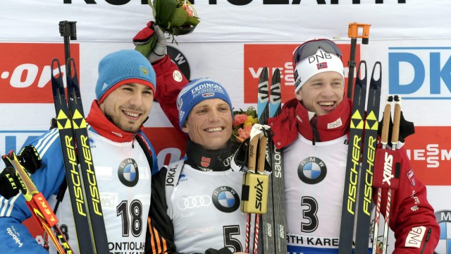 Shipulin, Lesser and Boe smile on the podium after their Men's Pursuit 12,5 km competition during the IBU Biathlon World Championships in Kontiolahti