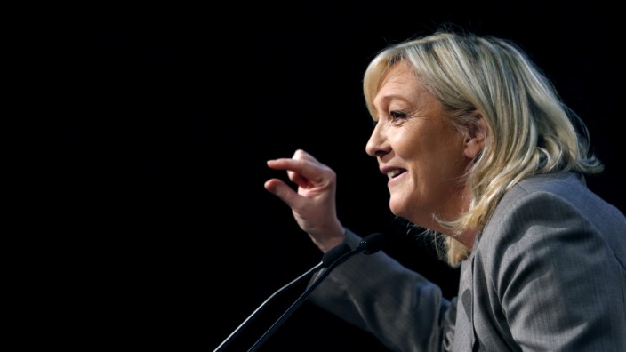 France's far-right National Front political party leader Marine Le Pen delivers a speech during a political rally in Six-Fours