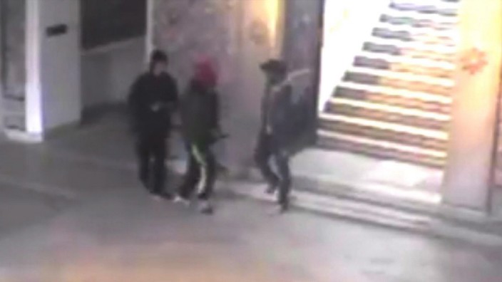 gunmen walking through the Bardo museum