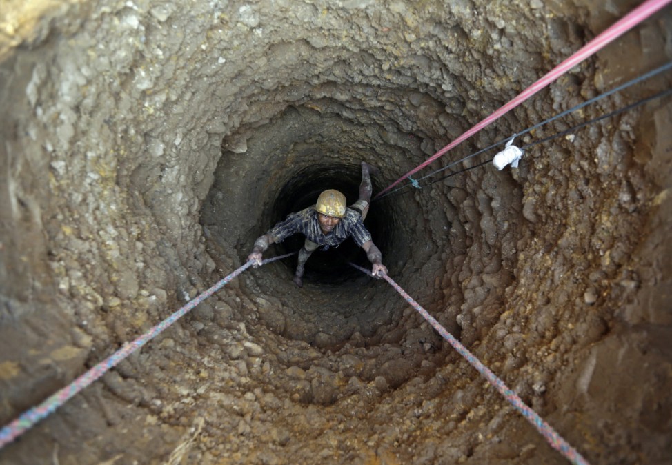 Digging for water in a well