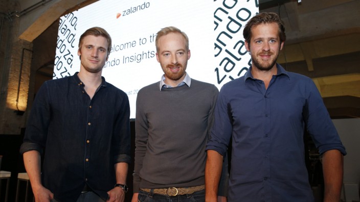Zalando management board members Schneider, Ritter and Gentz pose for the media during a media presentation in Berlin