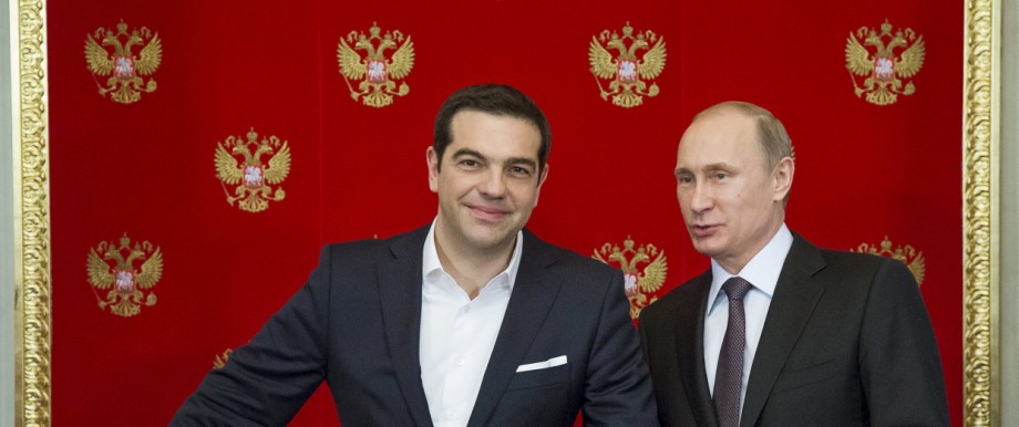 Russian President Putin and Greek Prime Minister Tsipras attend a signing ceremony at the Kremlin in Moscow