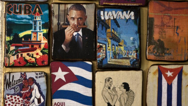 Kuba - USA: Versöhnung in atemberaubender Geschwindigkeit: Obama als Magnetmotiv auf einem Markt in Havanna, Kuba.