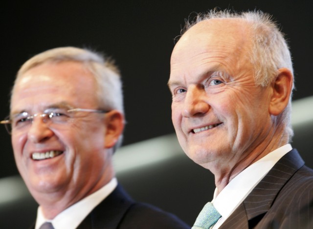 Chairman of the Board of German carmaker Volkswagen AG Piech and CEO Winterkorn smiles before the company's annual shareholder meeting in Hamburg