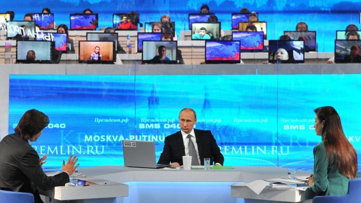 Russian President Vladimir Putin holds Q&A live broadcast TV and
