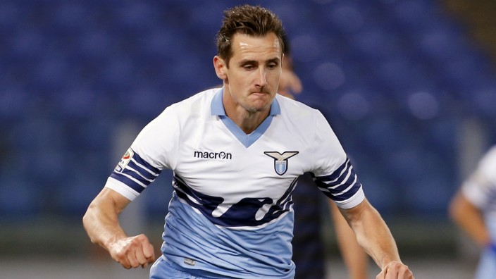 Lazio's Klose celebrates after scoring against Parma in their Serie A soccer match in Rome