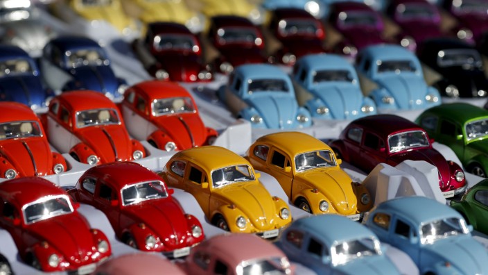 File photo of miniature models of Volkswagen beetles as seen during a Volkswagen Beetle owners' meeting in Sao Bernardo do Campo