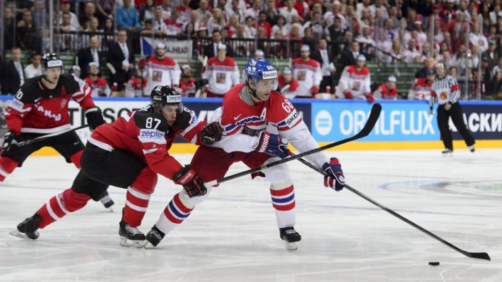 From left Sidney Crosby CAN and Jaromir Jagr CZE fight for a puck during the Ice hockey Eishock