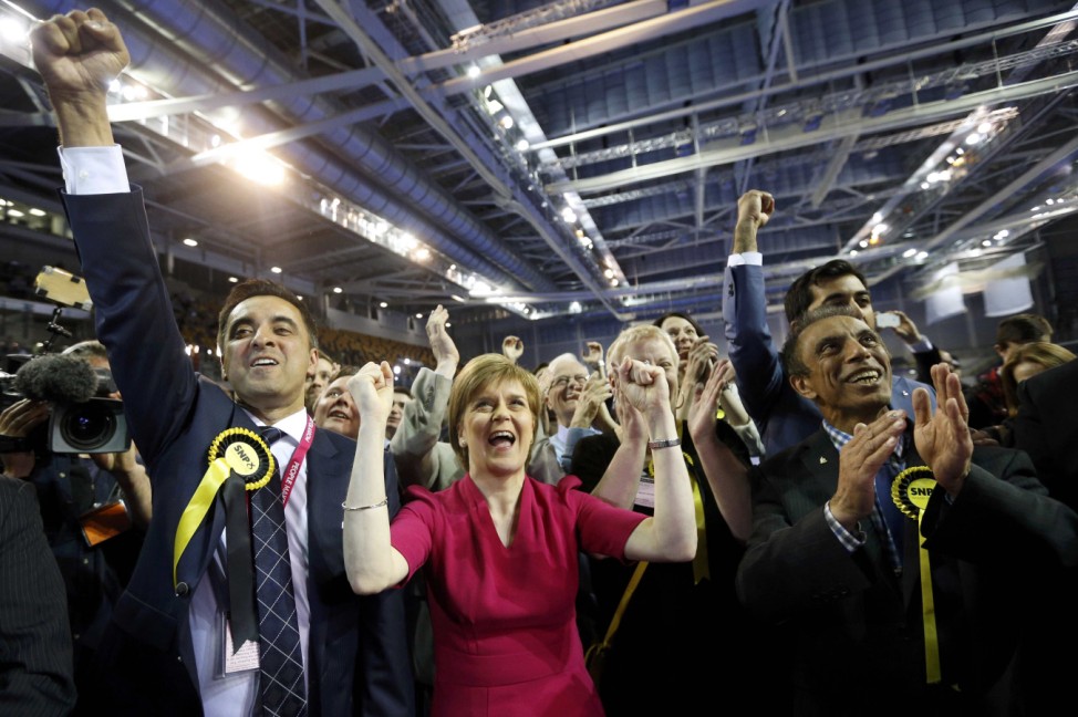 Sturgeon, leader of the Scottish National Party, reacts surrounded by candidates and supporters at a counting centre in Glasgow