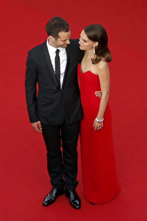 Actress Natalie Portman and her husband choreographer Benjamin Millepied pose on the red carpet for the opening ceremony and the screening of the film 'La tete haute' out of competition during the 68th Cannes Film Festival in Cannes
