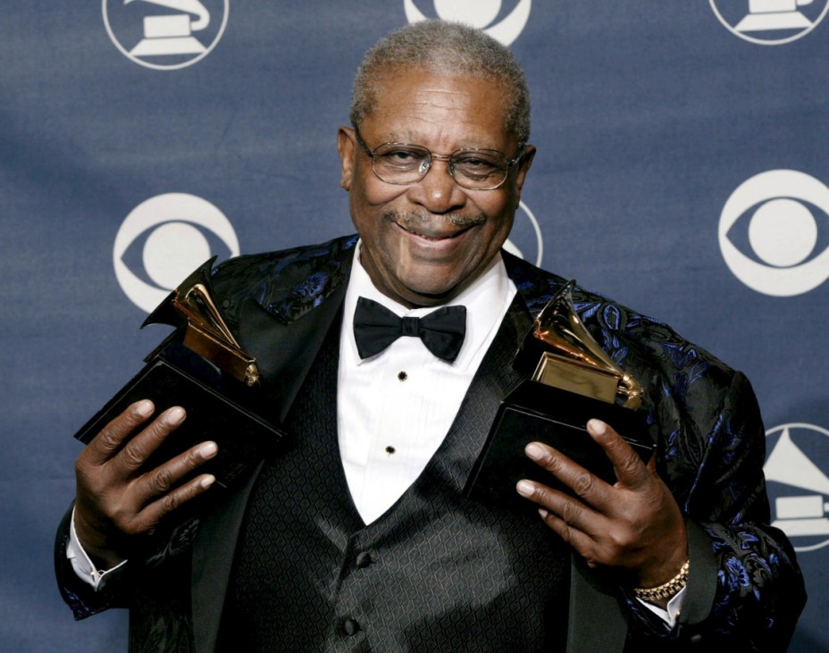 File photo of blues guitarist and singer B.B. King posing with the two Grammy Awards he won in New York