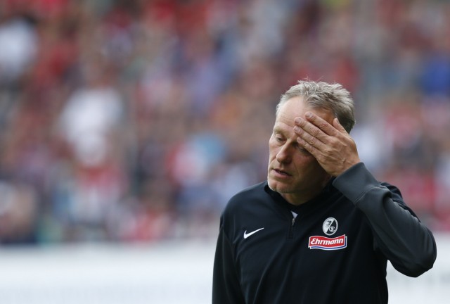 Freiburg's coach Streich reacts during their German Bundesliga first division soccer match against Bayern Munich in Freiburg