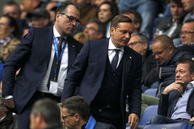 Schalke 04's boss Toennies and manager Heldt leave the tribune after first half-time during the Bundesliga first division soccer match against Paderborn in Gelsenkirchen