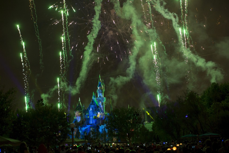 People watch the new 'Disneyland Forever' fireworks show during Disneyland's Diamond Celebration in Anaheim
